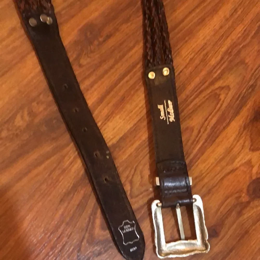 Brighton style genuine leather brown belt with silver detail.